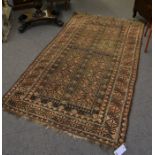 A Tekke rug, early 20th century, 81 1/2 x 44 1/2in.