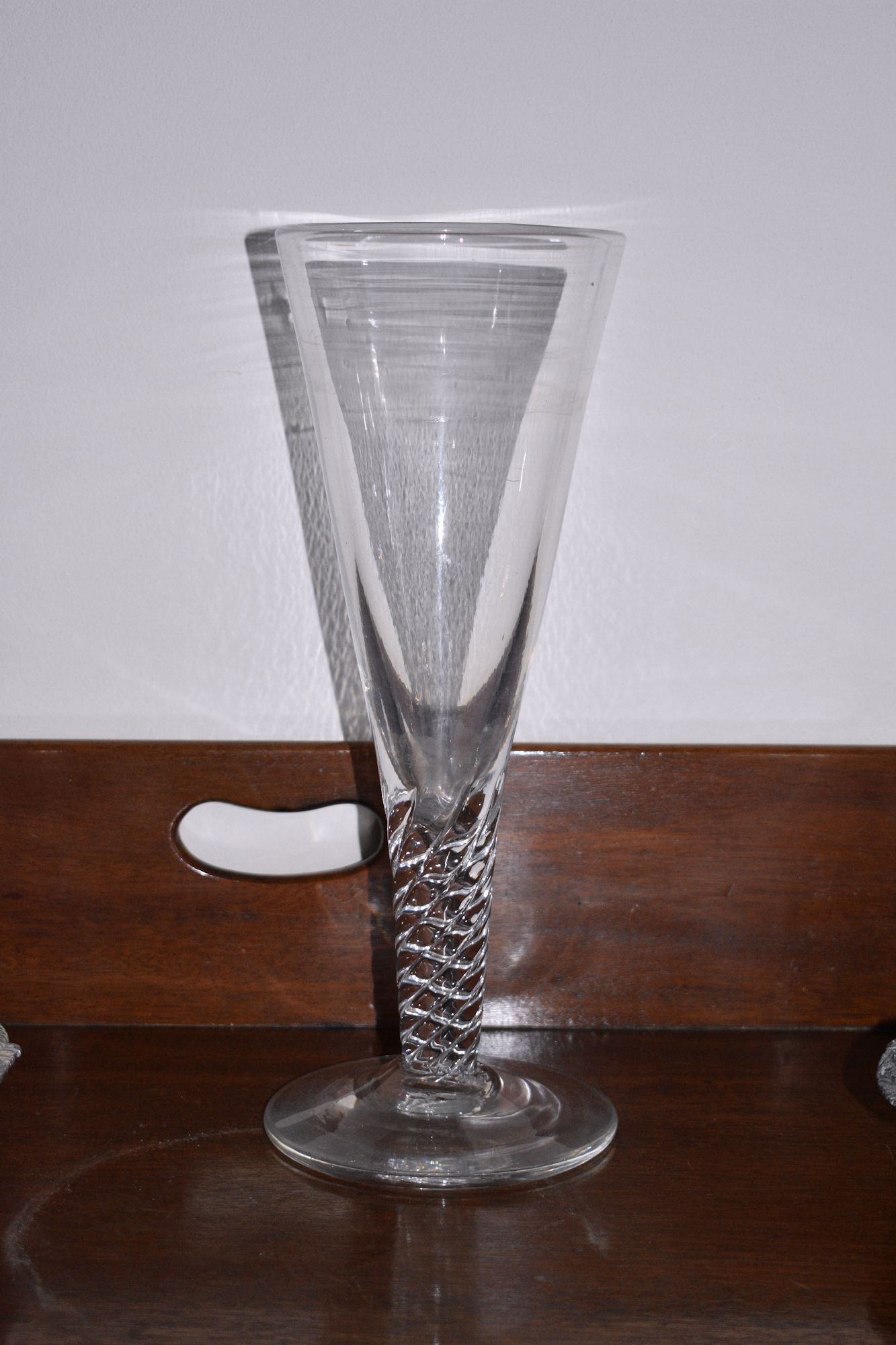 An oversized airtwist wine glass vase, 19th century, the drawn trumpet bowl on a multi-ply