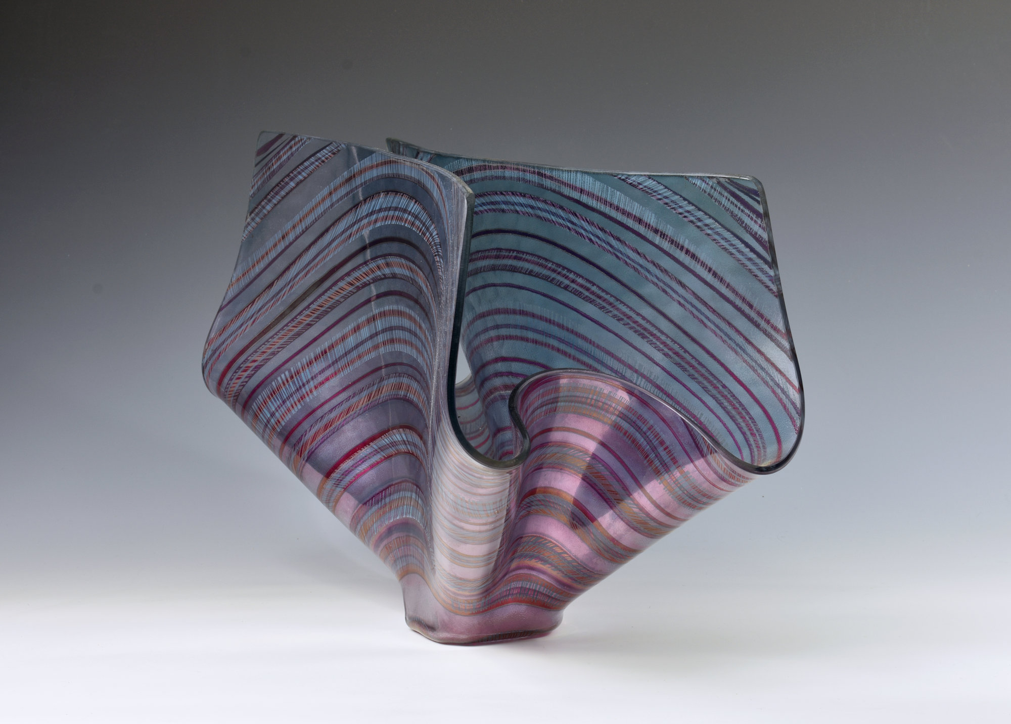 A 20th century Studio Art Glass vase, the unmarked purple iridescent vase of large proportions,