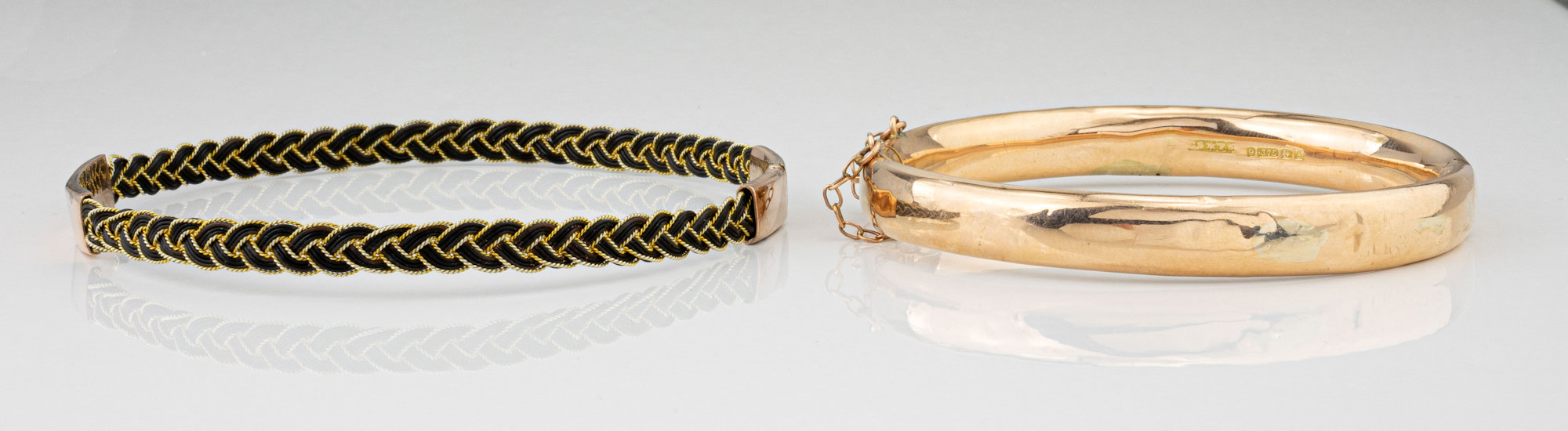 A Victorian 9ct gold and elephant hair braided bangle, with 9ct rose gold clasp; together with a 9ct