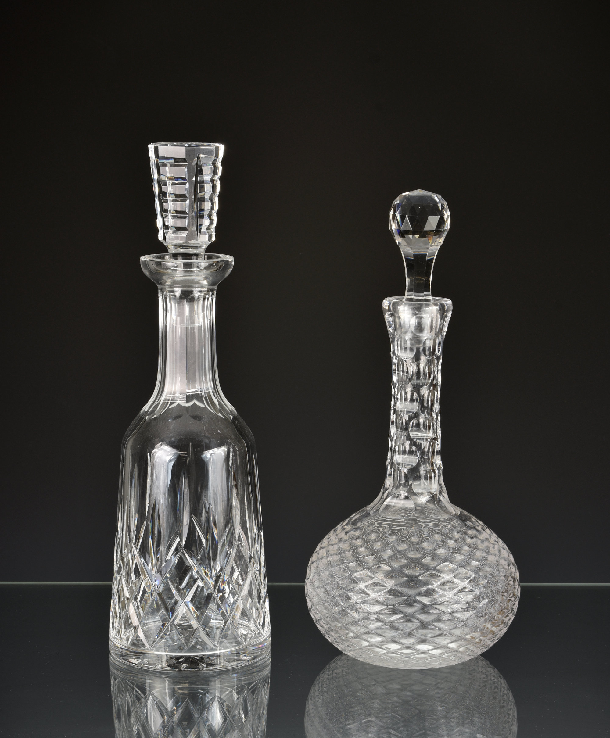 A Waterford crystal glass decanter in the 'Lismore' pattern, the elegant decanter with tapered