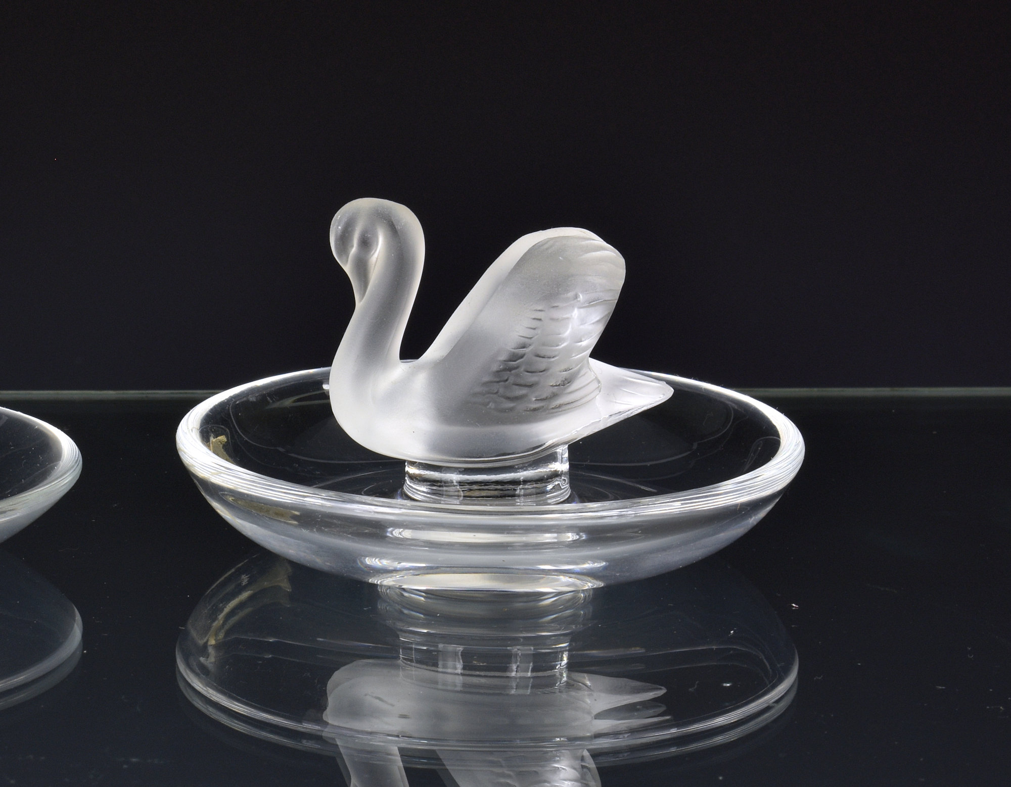 A Lalique glass 'Swan' pin dish, fourth quarter 20th century, etched signature to base, bearing