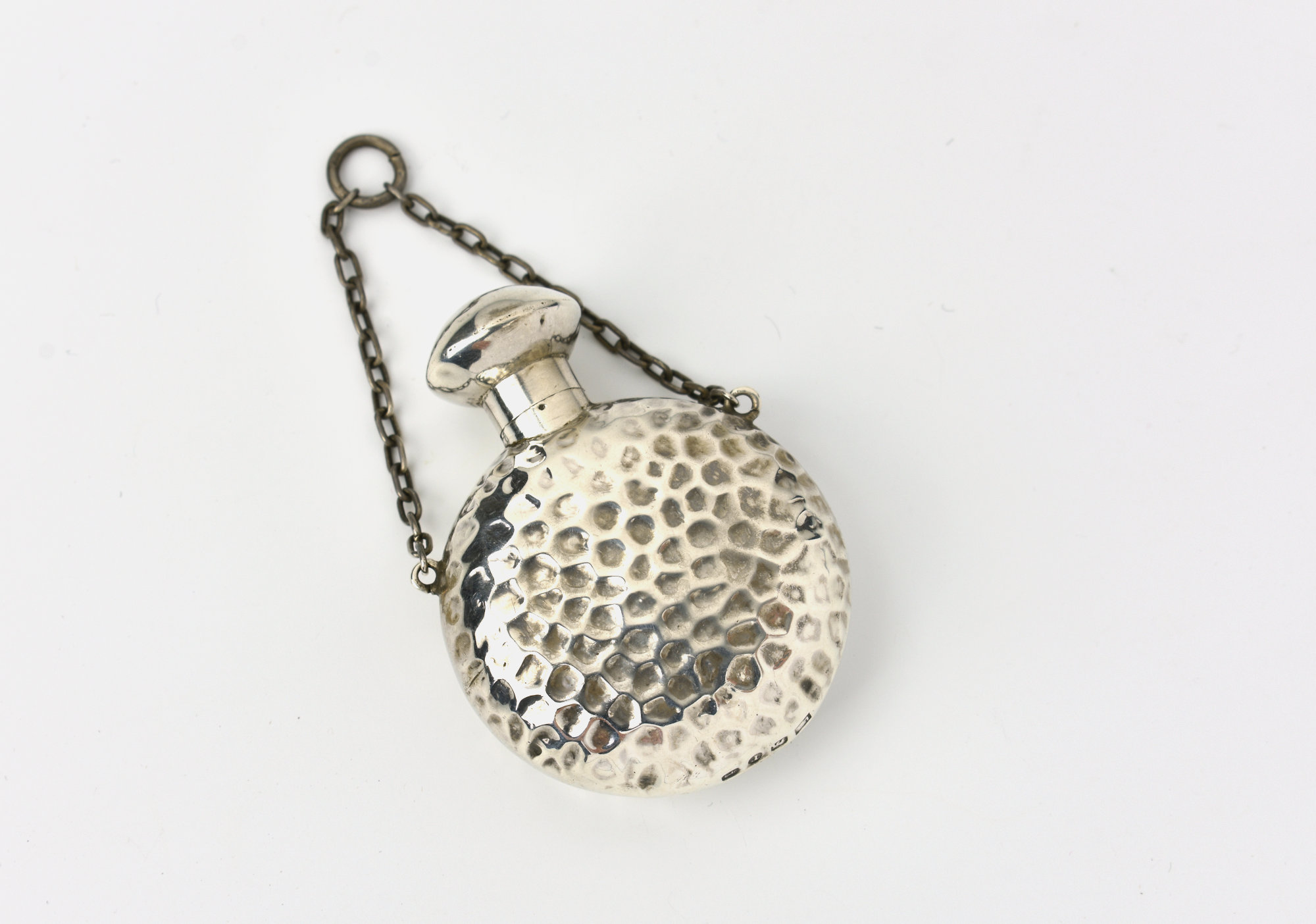 A Victorian silver scent bottle, Birmingham, 1891, maker's mark indistinct, of circular form with