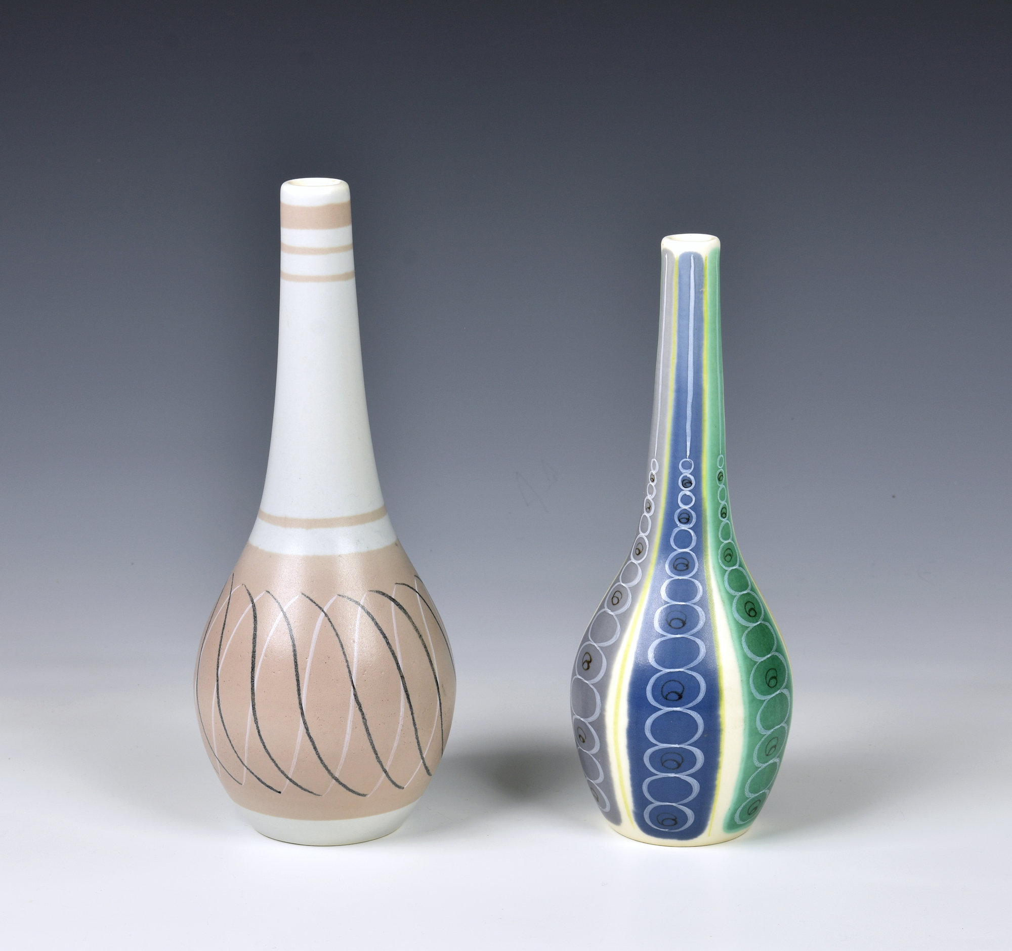 Two Poole Pottery "Freeform" bottle vases, 1950s, by Alfred Burgess Read, the larger, pattern PRB,