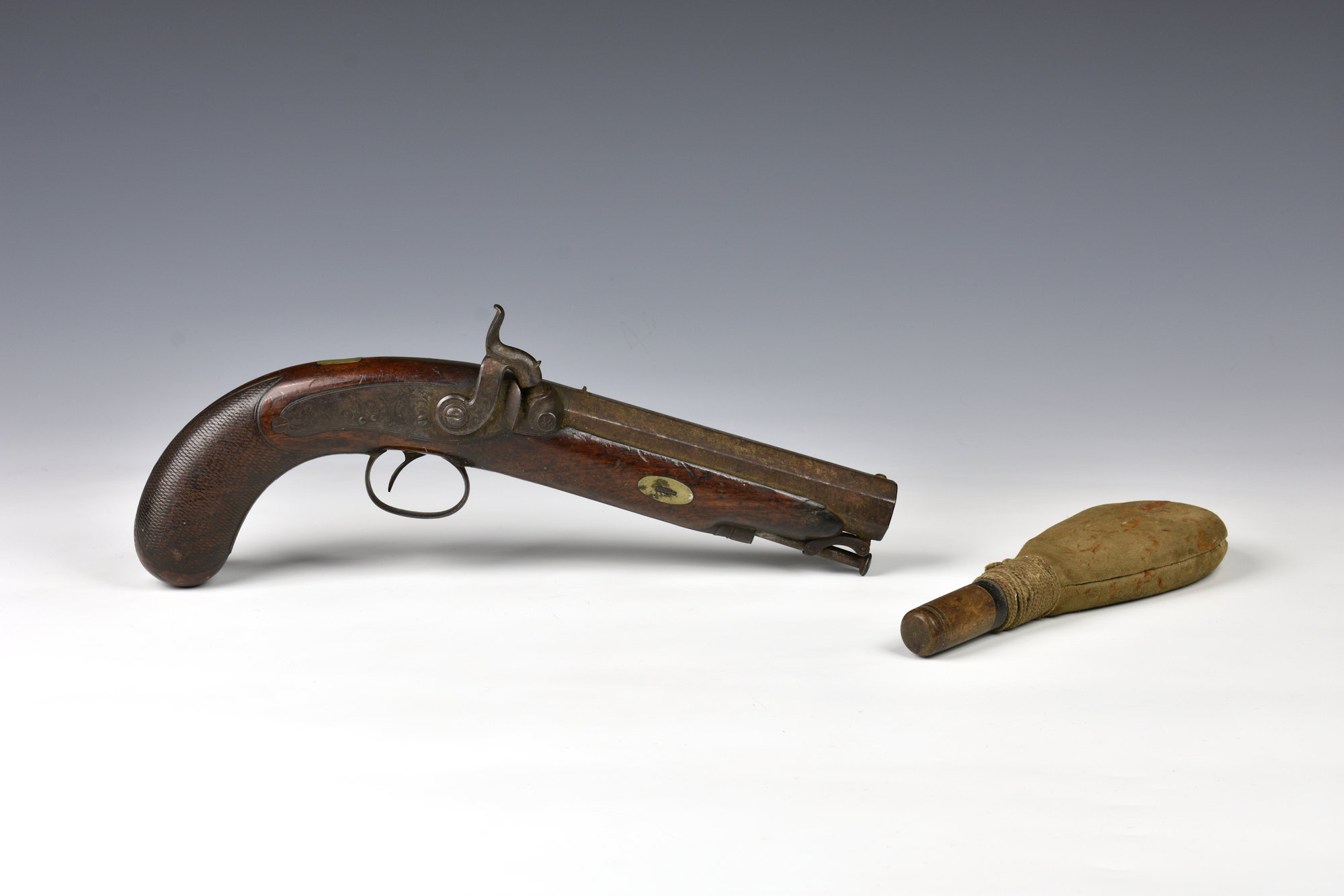 A 19th Century percussion officer's pistol by Baker of London, with sighted 15cm. octagonal