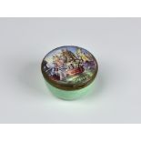 A late 18th / early 19th century enamel circular snuff box the lid painted with a maritime scene