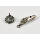 A miniature novelty silver whistle fashioned with a dog's head White & Reynolds, Chester 1904,