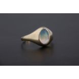 An 18ct gold and water opal ring with 8 x 5mm. opal, size J½.