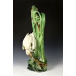 A majolica stick stand by Wiener Kunstkeramische Werkstatte, Austria c.1900, with impressed W.K.W