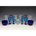 A pair of kingfisher blue wine glasses probably Victorian, 14.8cm.; together with a pair of