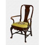 A George II figured and straight grain walnut open armchair the shaped back with solid vase splat,