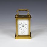 A gilt brass carriage clock with alarm, retailed by Henry Marc, Paris circa 1890, with Corniche