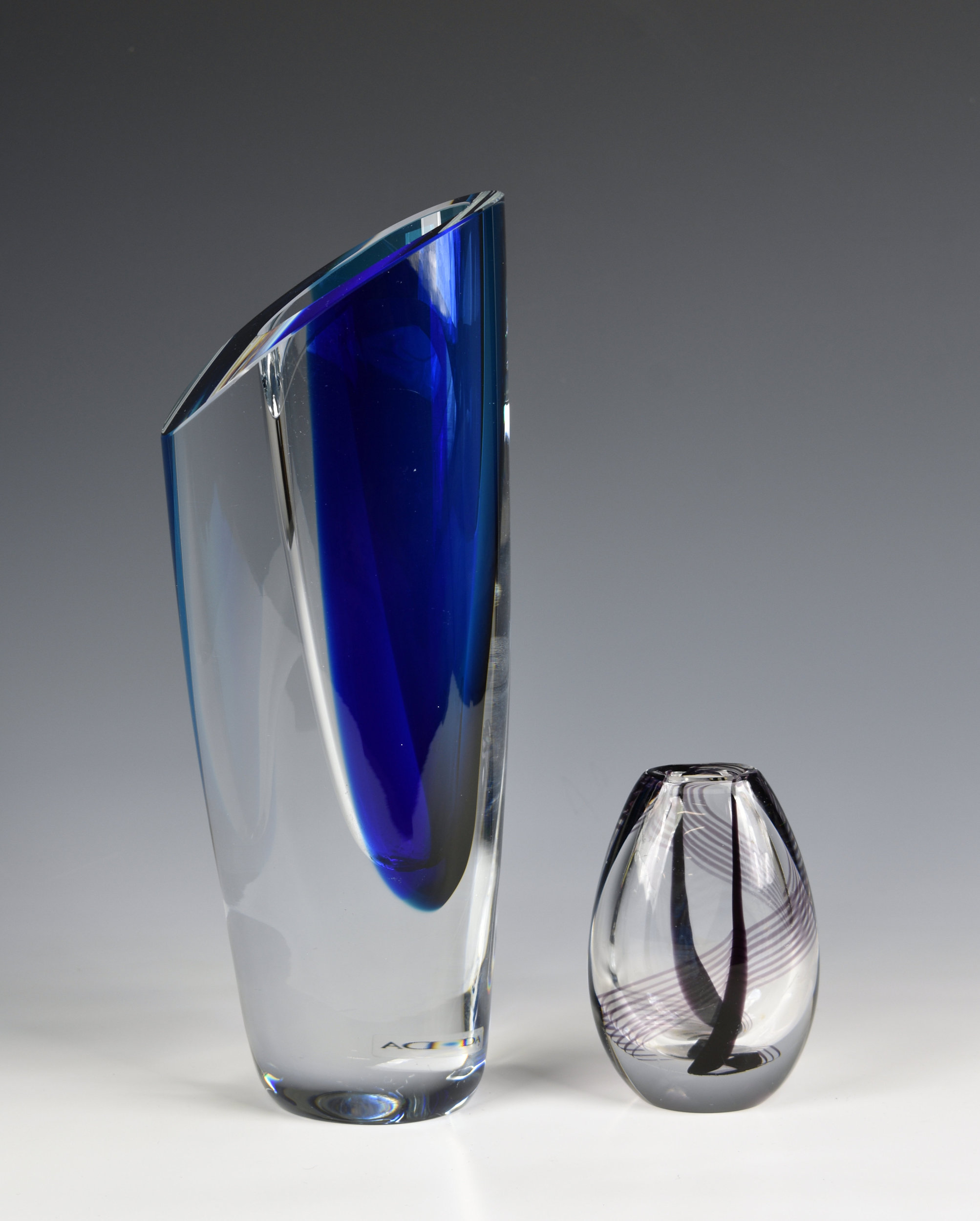 An art glass vase by Göran Wärff for Kosta Boda in blue and clear glass, etched mark 'Kosta Boda