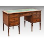 An English mahogany, cube parquetry and gilt metal bureau plat in the Louis XVI taste c.1900, the