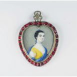 An 18th century heart shaped gold, silver and ruby portrait pendant probably Continental, the