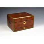 A fine Victorian burr amboyna and brass jewellery box the brass bound and strung box with rebated