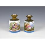 A matched pair of Paris porcelain scent flasks transfer printed with a courting couple in a pastoral