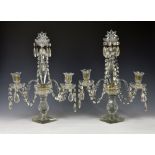 A pair of 19th century style cut glass two light candelabra mid-20th century, the tall central