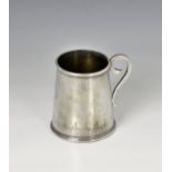A late 19th century Indian silver tankard tapered cylindrical form, finely engraved with wildlife
