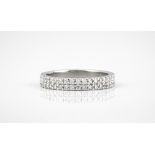 A platinum and diamond double row full eternity ring set with brilliant cut diamonds, total weight