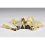 A collection of four ivory handled desk seals 19th century, comprising of a tapered and reeded