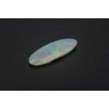 A loose, unmounted opal of elongated elliptical form, 21.5 x 7.9mm., 3.28ct.