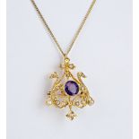 An Edwardian 18ct yellow gold, amethyst and seed pearl pendant brooch the openwork, heart shaped