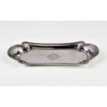 A George III silver snuffer tray John Young & Sons, Sheffield 1798, the shaped rectangular tray with