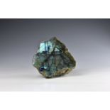 A large polished Labradorite boulder specimen with rich colours to both the front polished face