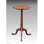 A George II style mahogany tripod wine table c.1900, the rounded hexagonal top with Chippendale