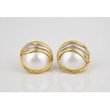 A pair of 18ct two-tone gold and Mabe pearl earrings the 18mm.pearls with triple swept line