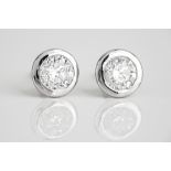 A pair of 18ct white gold and diamond stud earrings the brilliant cut diamonds, total 1.59ct, in