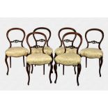 A set of six Scottish Victorian walnut balloon back dining chairs the seat rails stamped 'John