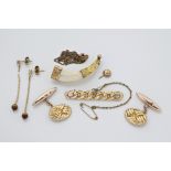A 9ct gold chain link bar brooch together with a gold mounted bone 'tooth' brooch; a pair of 9ct
