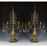 A pair of neo-classical style ormolu, cut glass and malachite two light candelabra possibly Russian,