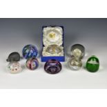 A small collection of glass paperweights comprising Caithness Fiesta, Honesty and golfer; boxed