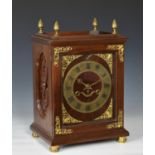 A late-19th century mahogany cased musical mantel clock by the New Haven Clock Company the "Eight-