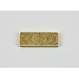 A rectangular flat ivory needle case probably late 18th or early 19th century, bas-relief floral and