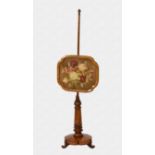A 19th century bird's eye maple pole screen the shaped rectangular adjustable section with floral
