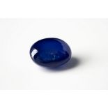 A loose, unmounted oval cabochon sapphire 8.5 x 6.5mm., 2.68ct.