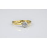An 18ct yellow gold and diamond solitaire ring the approx. 0.30ct brilliant cut diamond in a crown