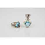 An 18ct yellow gold, silver and blue gemstone ring and pendant en suite with medieval style