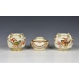 A pair of 19th century Royal Worcester four handled porcelain vases c. 1855, of squat form,
