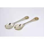 A pair of Channel Islands silver and 9ct gold novelty tea spoons by Bruce Russell date letter E (