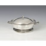 An American silver card tray of circular form, 7in. (17.8cm.) diameter, weight 4.5 tr.oz.;