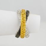 A David Morris 18ct white gold, yellow sapphire and black and white diamond triple shank ring the