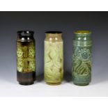 Three Poole Pottery ' Ionian ' vases 1960s-70s, cylindrical form with waisted neck, printed