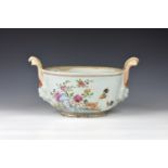 An 18th century Chinese export porcelain tureen Qianlong period (1736-1795), oval form, with twin
