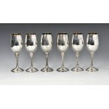 Anthony Elson for Asprey & Co Ltd - a set of six modernist silver & silver gilt wine goblets
