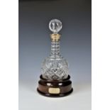 A Channel Islands silver and cut glass decanter by Bruce Russell hallmarked 1997, the shaft and